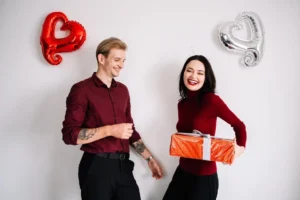 boy giving gifts to girl