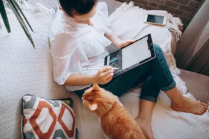 women working on ipad