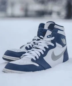 sneakers placed on snow