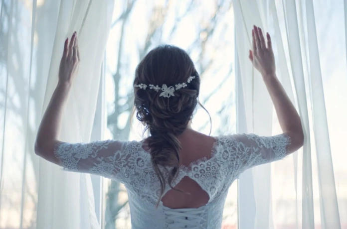 girl opening window