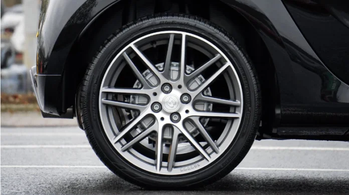 black car with alloy wheel