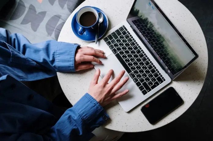 person working at laptop