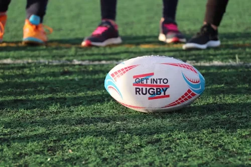 rugby ball on grass ground