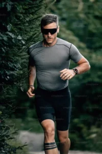 a man in grey shirt running