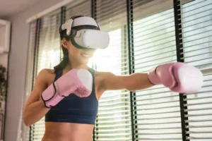 girl wearing boxing gloves and VR glasses