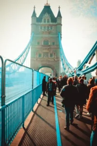 people walking on a bridge