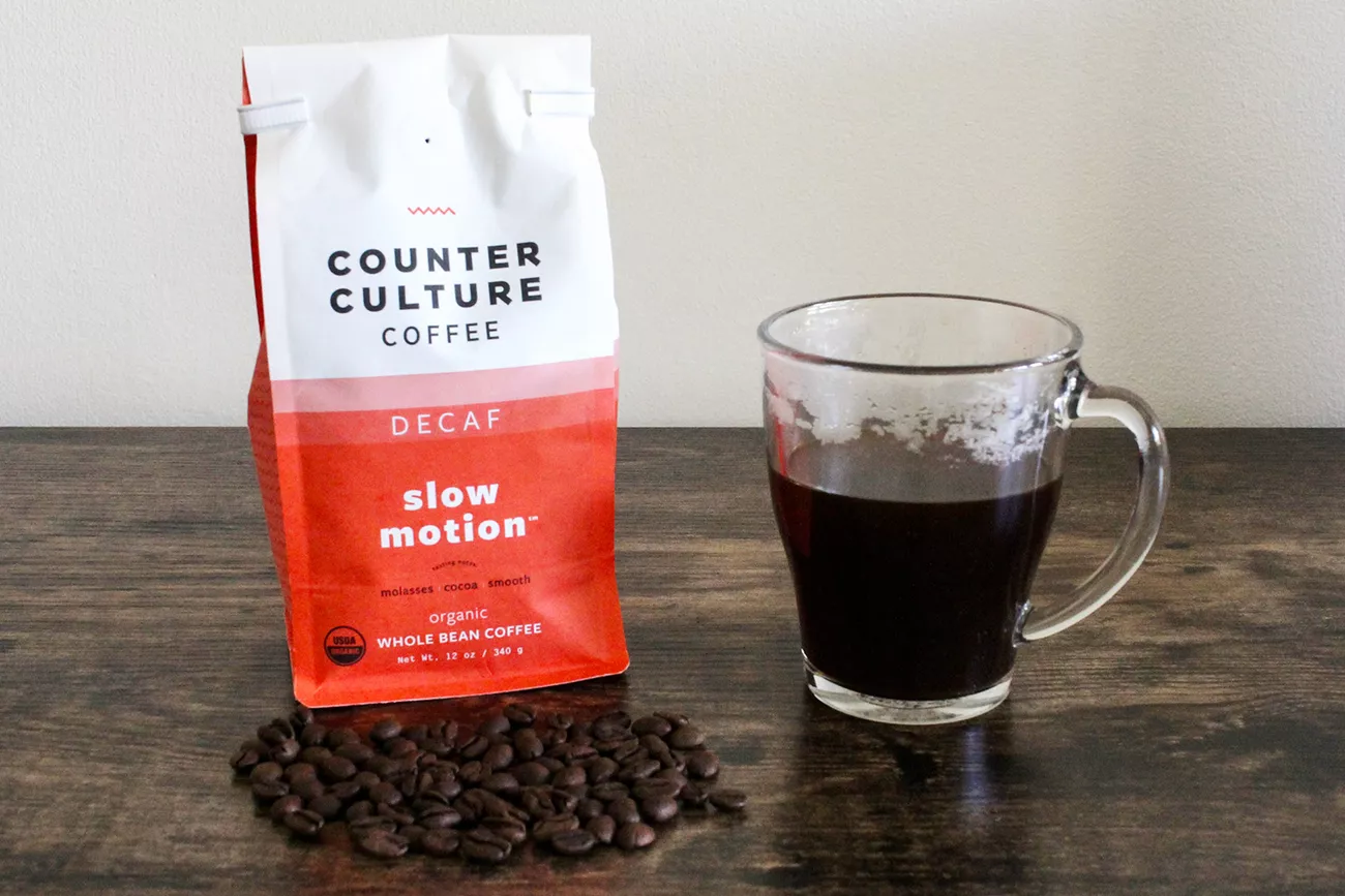 counter culture coffee packet and coffee on table